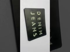 الجينز الجلدية العلامة الجلدية الأسود للملابس العلامة الجلدية السوداء