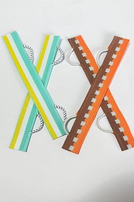 ملصقات ملابس منسوجة مخصصة، قطع بالموجات فوق الصوتية، مع طي النهاية، تفاصيل التعبئة: 500-1000 قطعة/كيس أو لكل صندوق